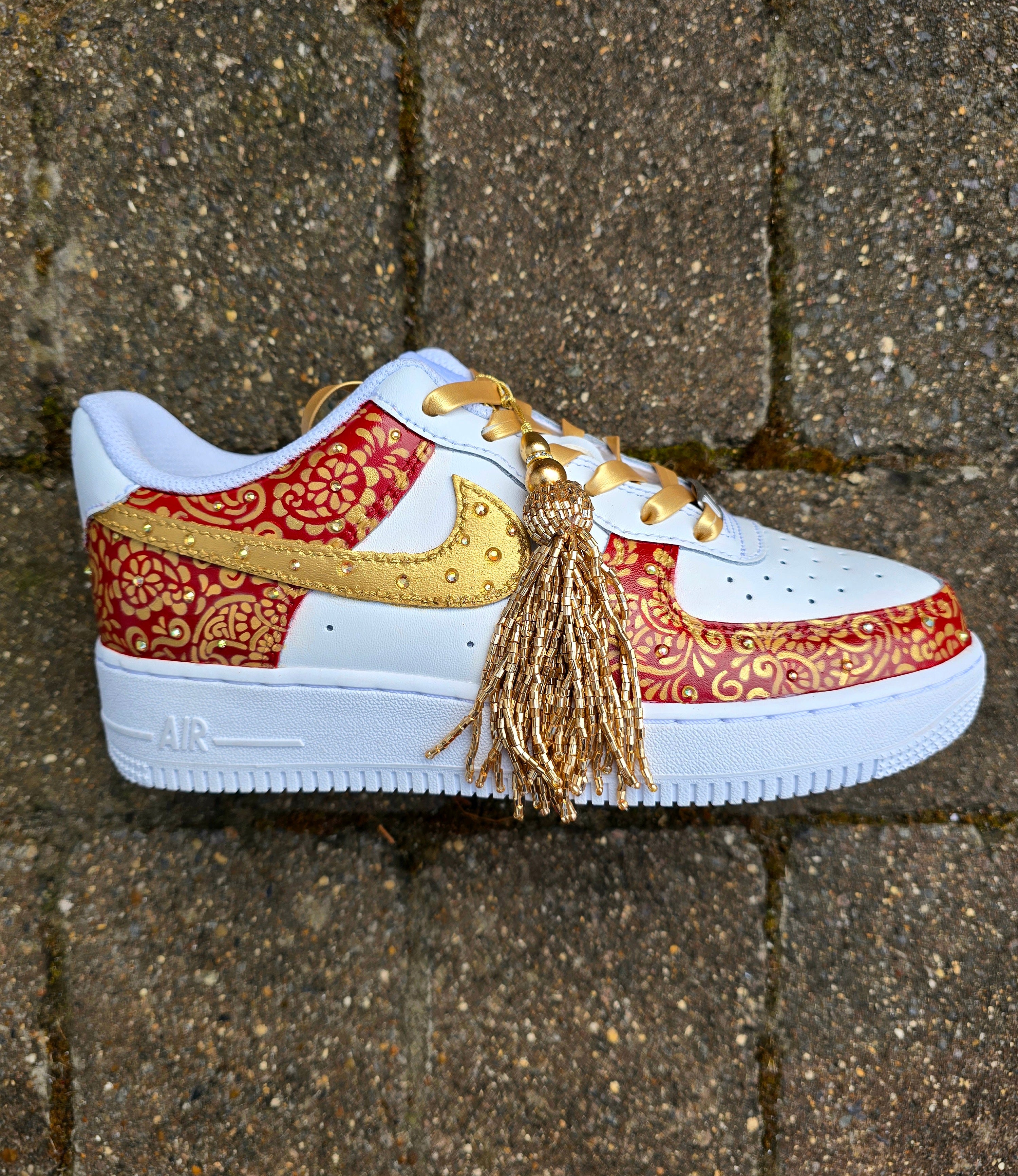 Indian Bridal Wedding Nike AF1 sneakers with crystals -  hand painted with henna mehendi designs in maroon and gold. Topped with rhinestones and paranda 