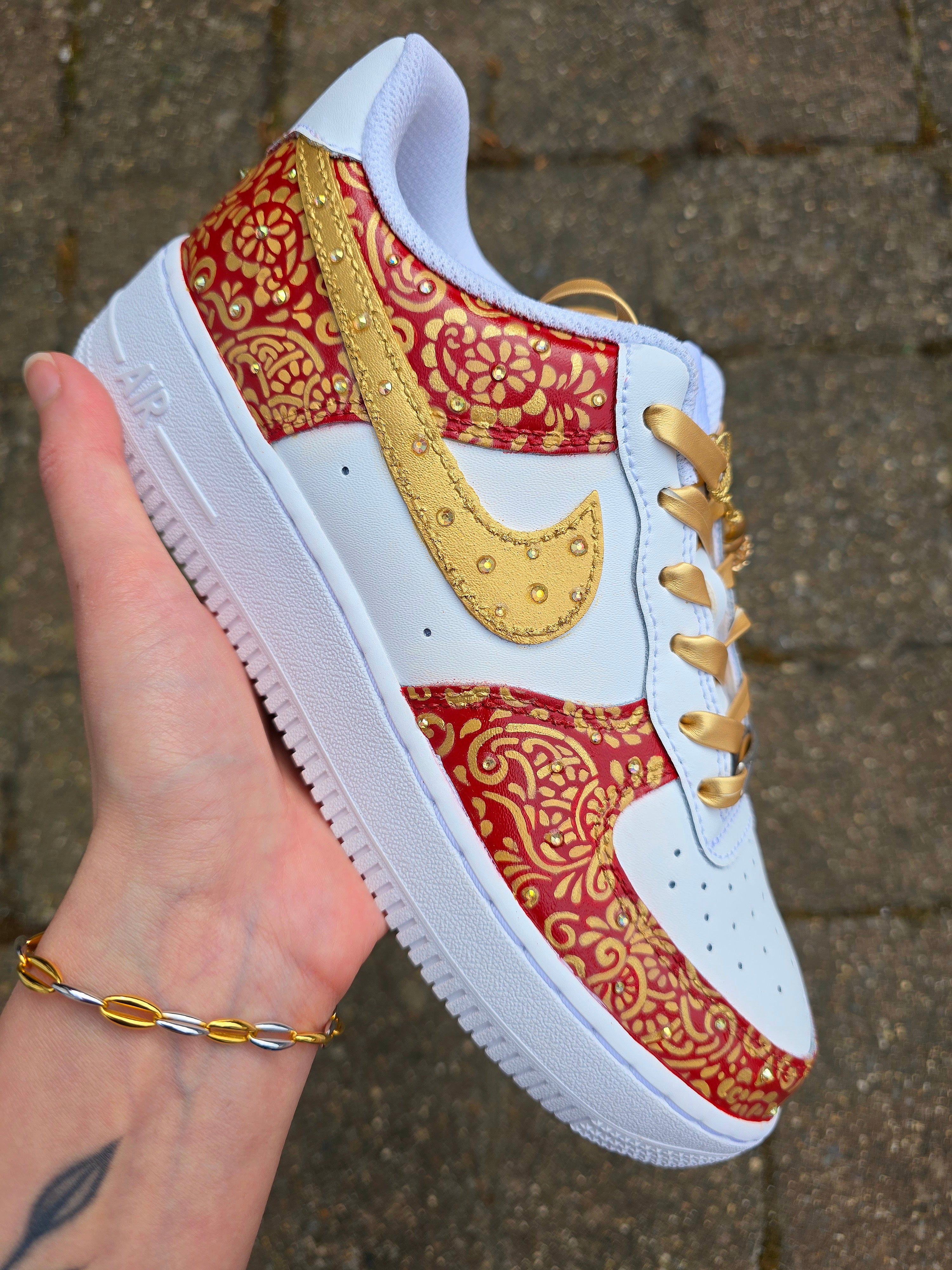 Indian Bridal Wedding Nike AF1 sneakers with crystals -  hand painted with henna mehendi designs in maroon and gold. Topped with rhinestones and paranda 