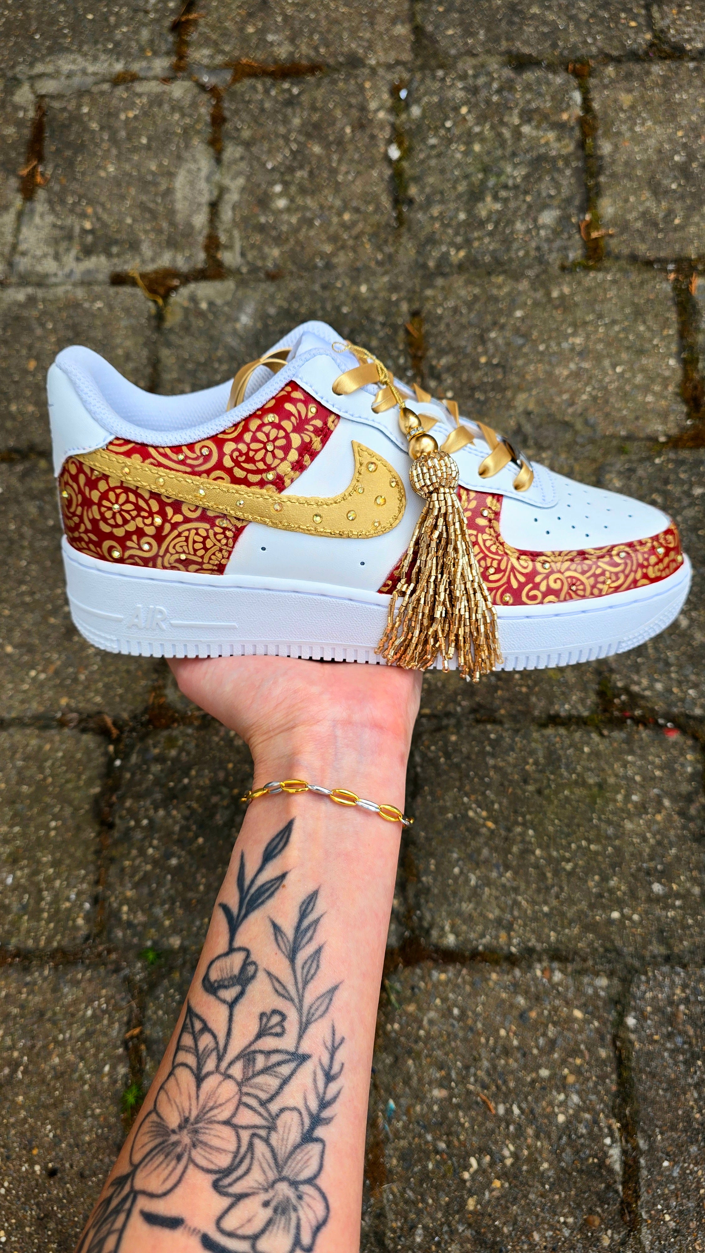 Indian Bridal Wedding Nike AF1 sneakers with crystals -  hand painted with henna mehendi designs in maroon and gold. Topped with rhinestones and paranda 