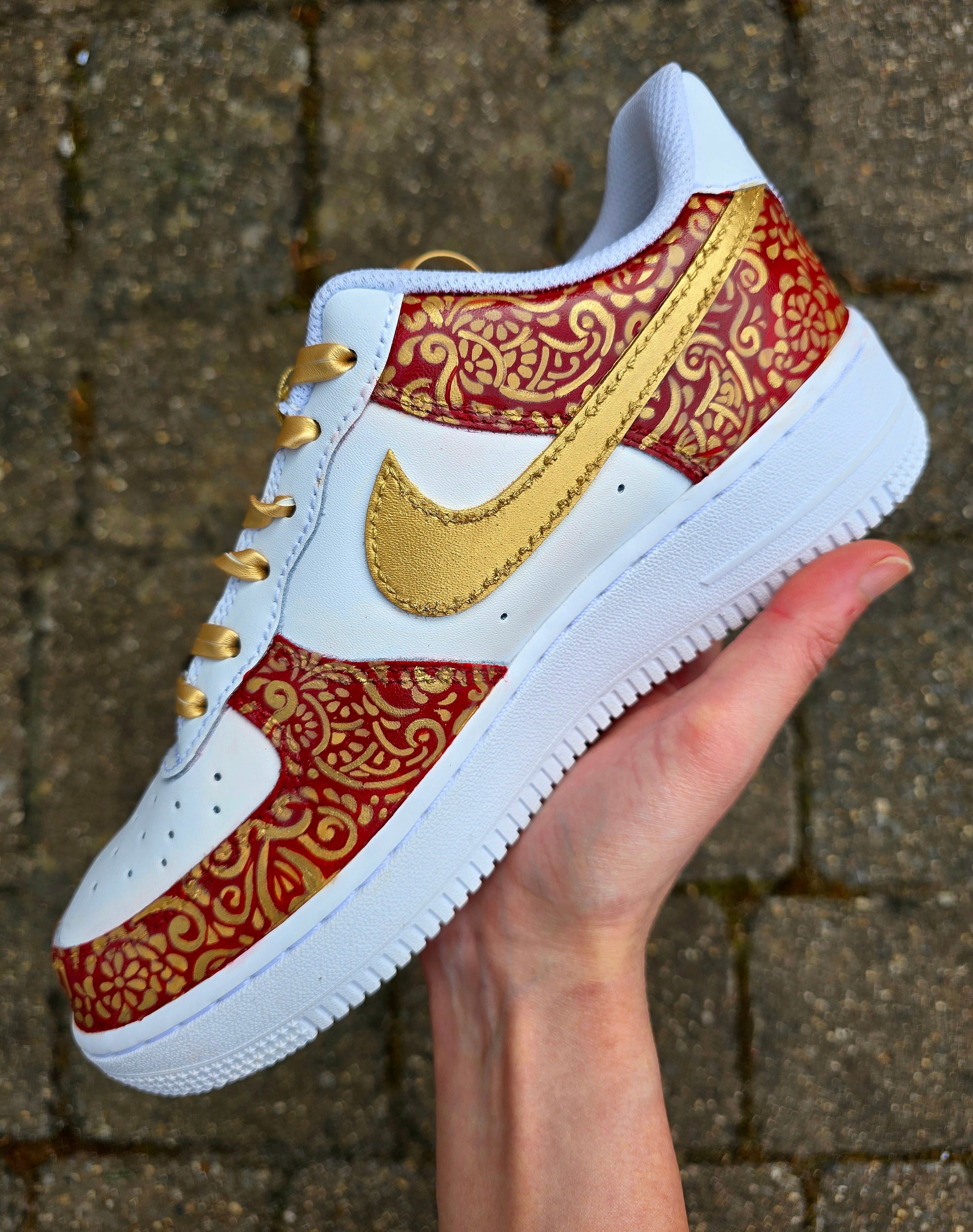 Indian Bridal Wedding Nike AF1 sneakers with crystals -  hand painted with henna mehendi designs in maroon and gold. Topped with rhinestones and paranda 