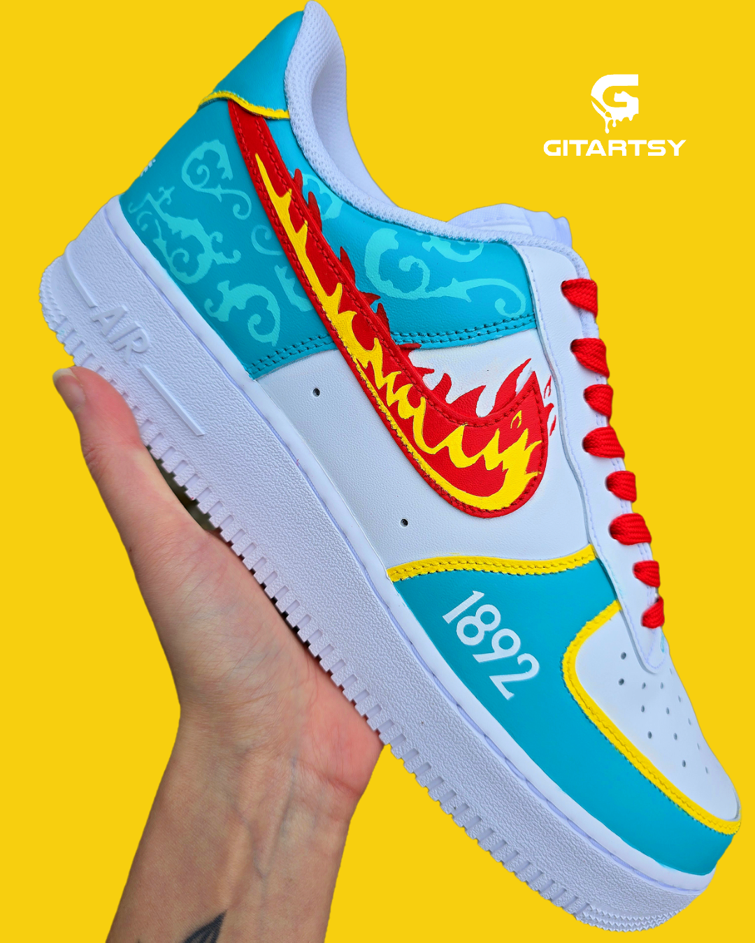 Liverpool FC Inspired Custom Hand-Painted Nike Air Force 1 Sneakers. These one-of-a-kind kicks feature a bold and artistic take on the LFC logo, incorporating dynamic fire swooshes, intricate teal green crest designs, and club-inspired detailing that captures the spirit of Anfield. Perfect to match with the LFC kit. 