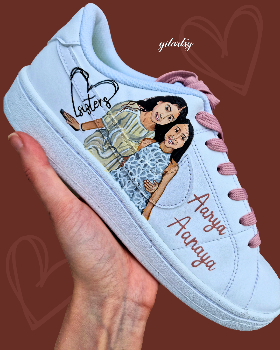 Custom hand-painted Nike sneakers featuring a realistic portrait of a mother and her daughters, personalized names, floral details, and loving elements like “Mama” and “Ba.” Crafted in white leather with pink swooshes and laces, these shoes are a perfect Mother’s Day gift showcasing unique wearable art.

