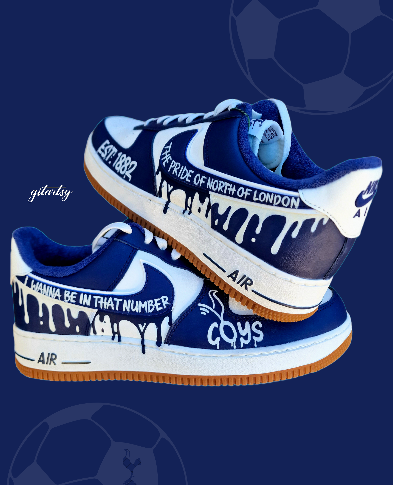 Custom hand-painted Nike Air Force 1 sneakers in navy and white featuring Tottenham Hotspur-inspired artwork, paint drip design, and fan chants including “COYS”, “The Pride of North of London”, “I Wanna Be In That Number”, and “Est. 1882”, created by Gitartsy with premium leather paint and sealing for durability and vibrancy.

