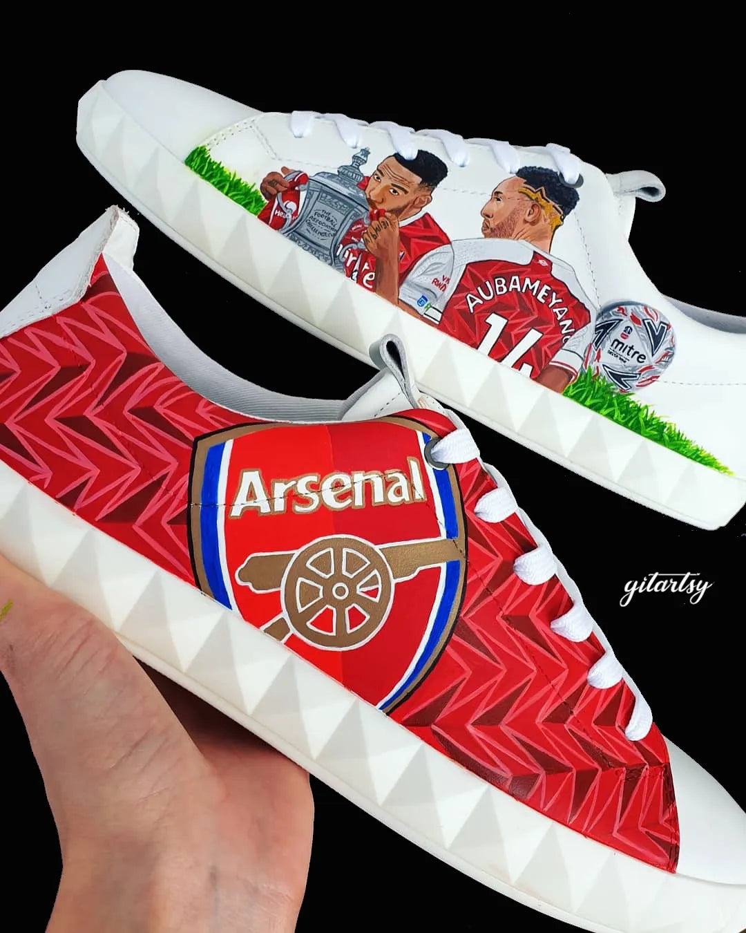 Realistic portraits of footballer Pierre-Emerick Aubameyang and Arsenal FC logo hand painted on white Armani sneakers shoes
