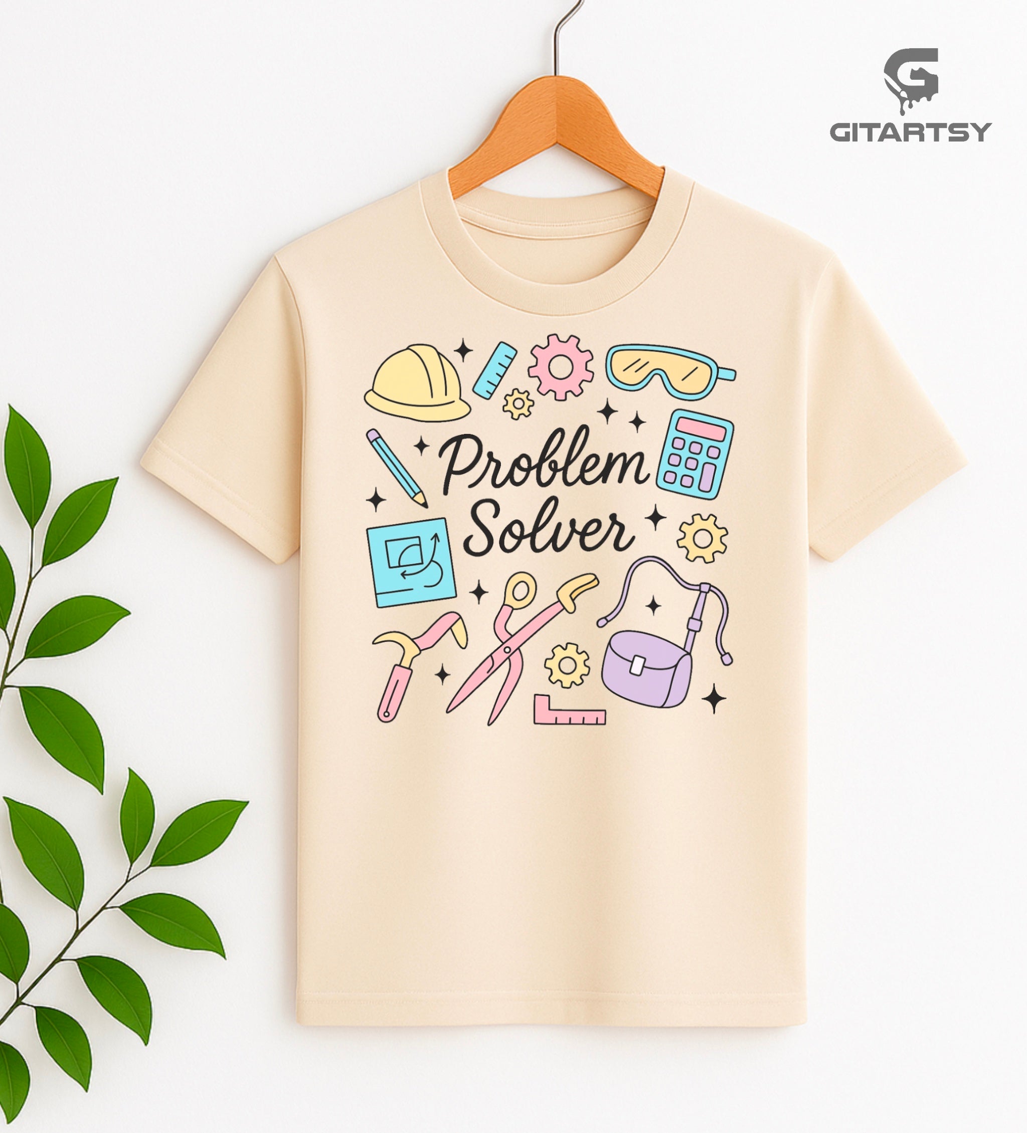 Pastel graphic T-shirt with "Problem Solver" text surrounded by icons of tools, calculator, hard hat, and ruler – ideal for handywomen, DIY lovers, and engineers.