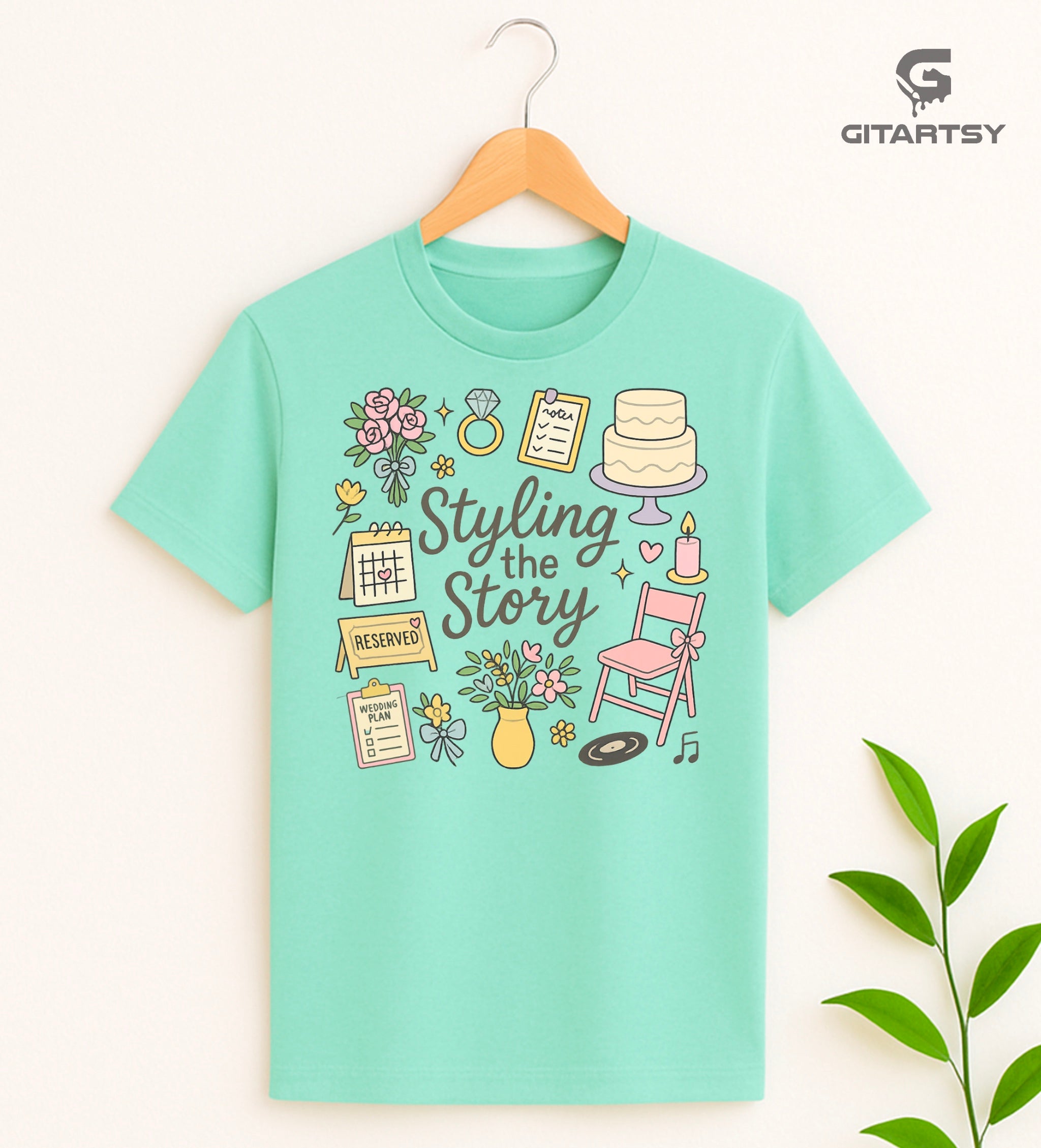 T-shirt featuring the quote "Styling the Story" surrounded by pastel illustrations of wedding flowers, calendar, RSVP notes, cake, chair, ring, and planner icons – perfect for bridal stylists and wedding planners.