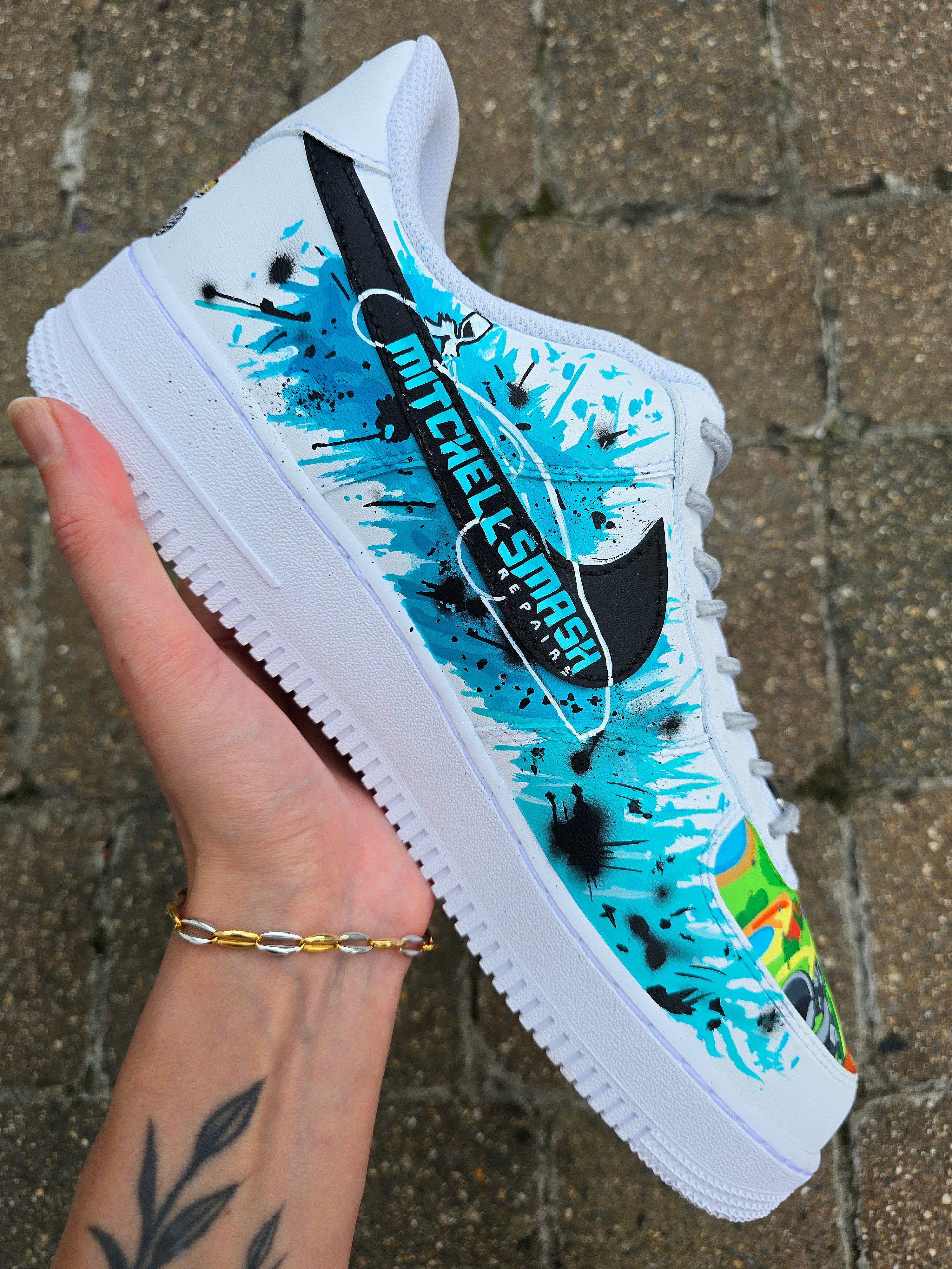 Custom hand-painted Nike Air Force 1 sneakers featuring a Lamborghini-inspired design 🏎️ and spray painter artwork 🎨. Created by Gitartsy using premium leather paints, sealed for durability, and fully customisable with personal details such as car models, colors, and text. Perfect for car enthusiasts 🚗, sneaker collectors 👟, and streetwear lovers seeking one-of-a-kind footwear.

