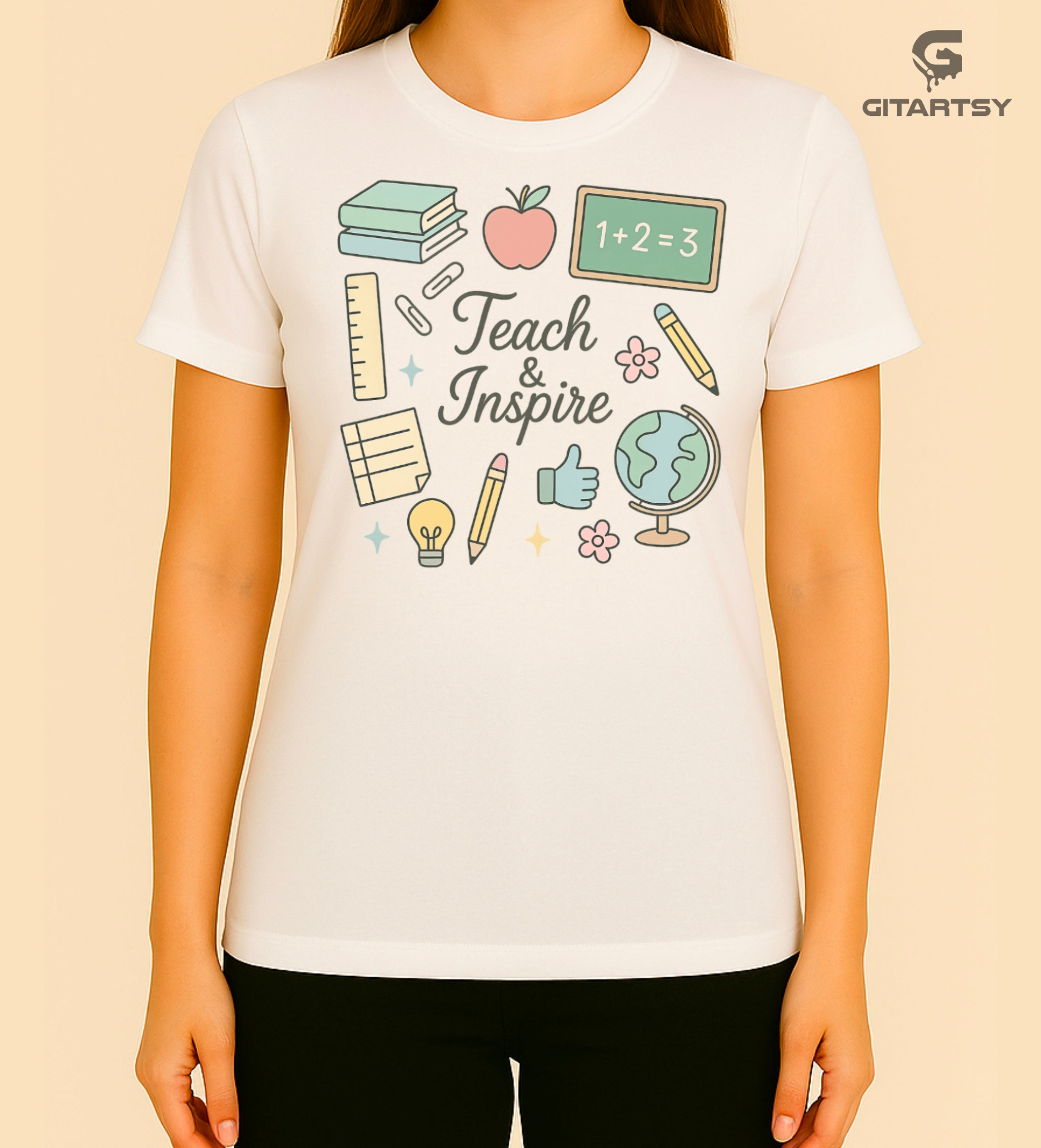 T-shirt with pastel illustrations of school supplies and the phrase “Teach & Inspire” – designed for teachers, tutors, and educators.