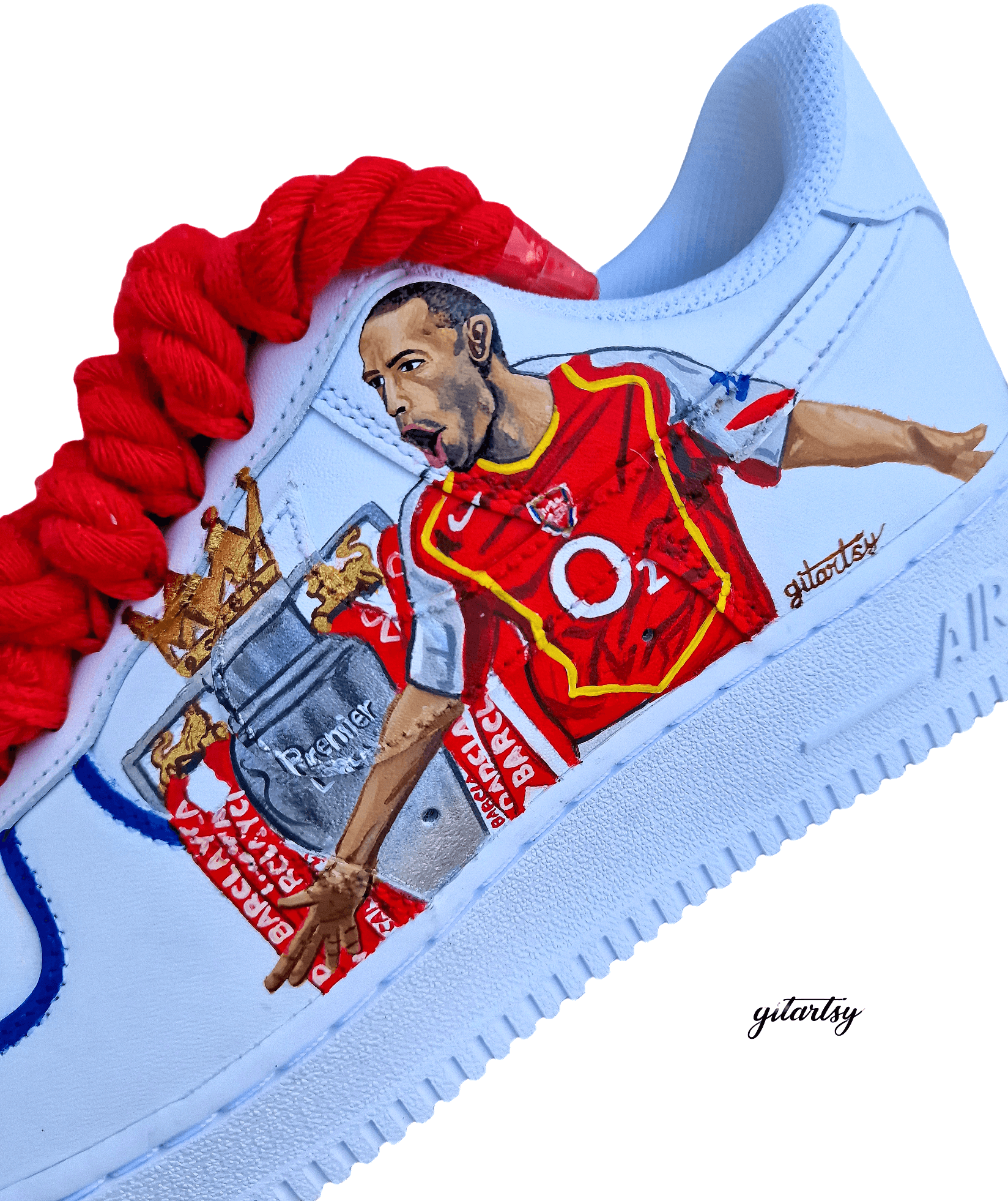 Hand-painted custom Nike Air Force 1 sneakers featuring Arsenal legend Thierry Henry, the Arsenal crest, Premier League trophy, and bold red laces. Perfect for Arsenal fans and football sneaker collectors.


