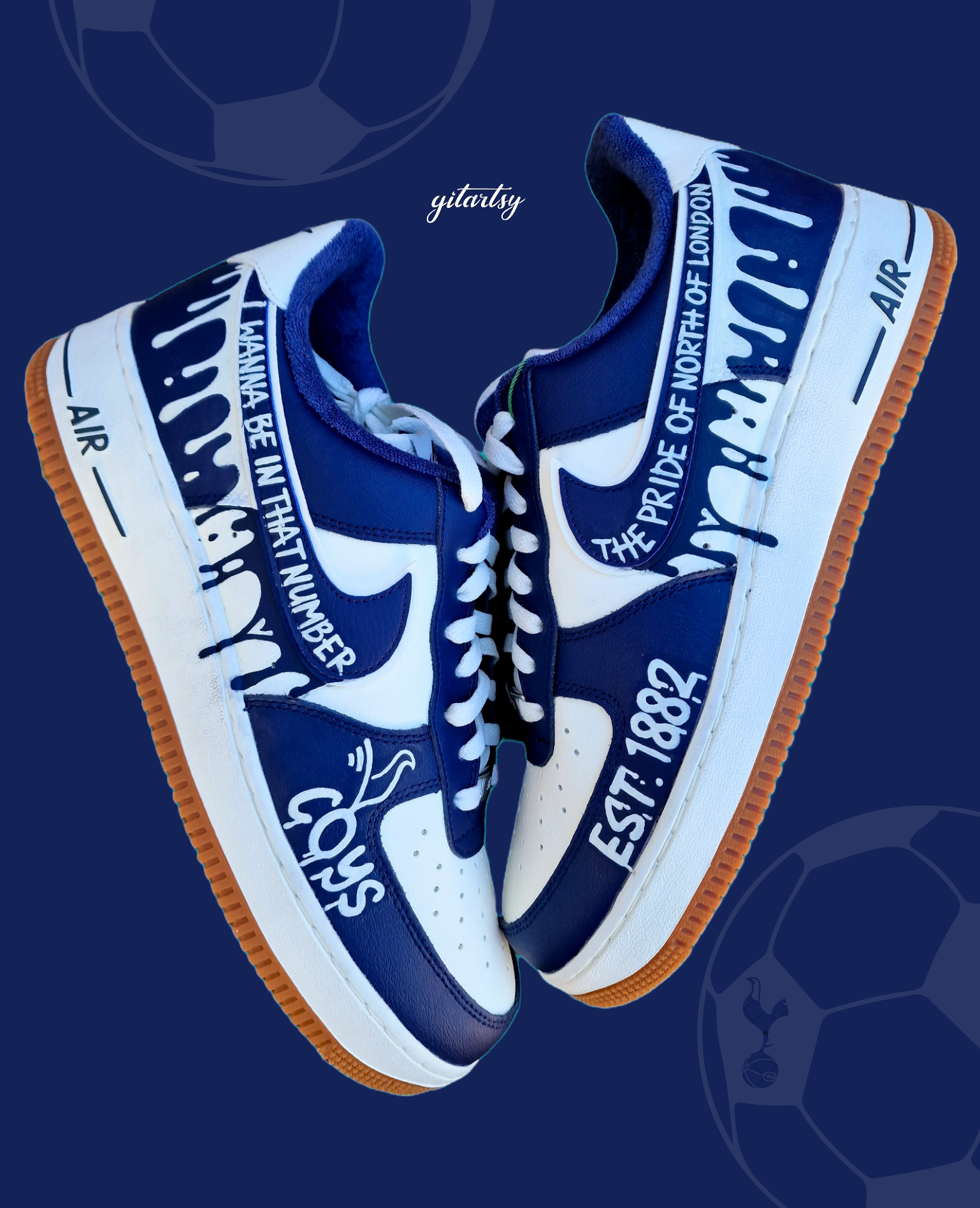 Custom hand-painted Nike Air Force 1 sneakers in navy and white featuring Tottenham Hotspur-inspired artwork, paint drip design, and fan chants including “COYS”, “The Pride of North of London”, “I Wanna Be In That Number”, and “Est. 1882”, created by Gitartsy with premium leather paint and sealing for durability and vibrancy.

