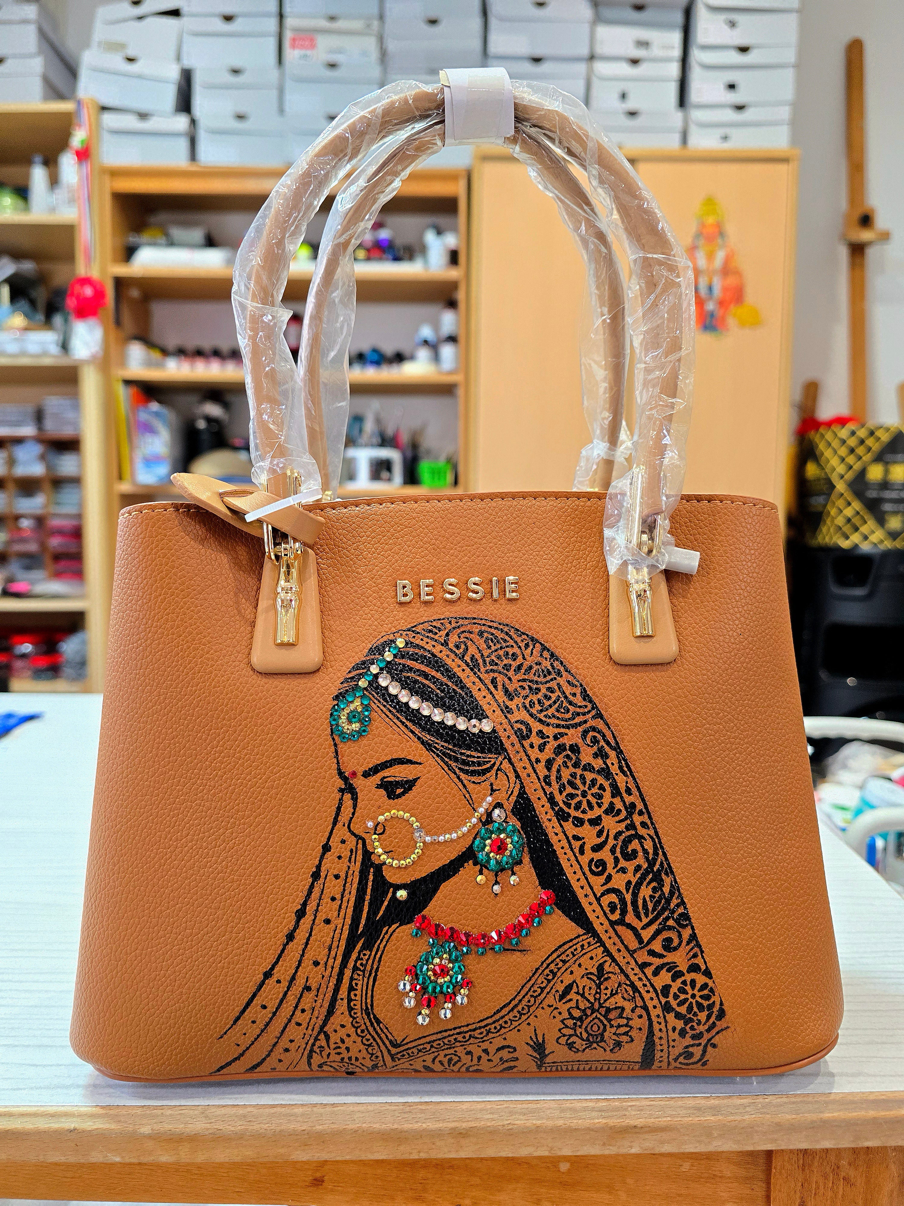 Hand painted bessie London tan brown bag with indian bride illustration and shiny crsystals and rhinestones on the jewellery 