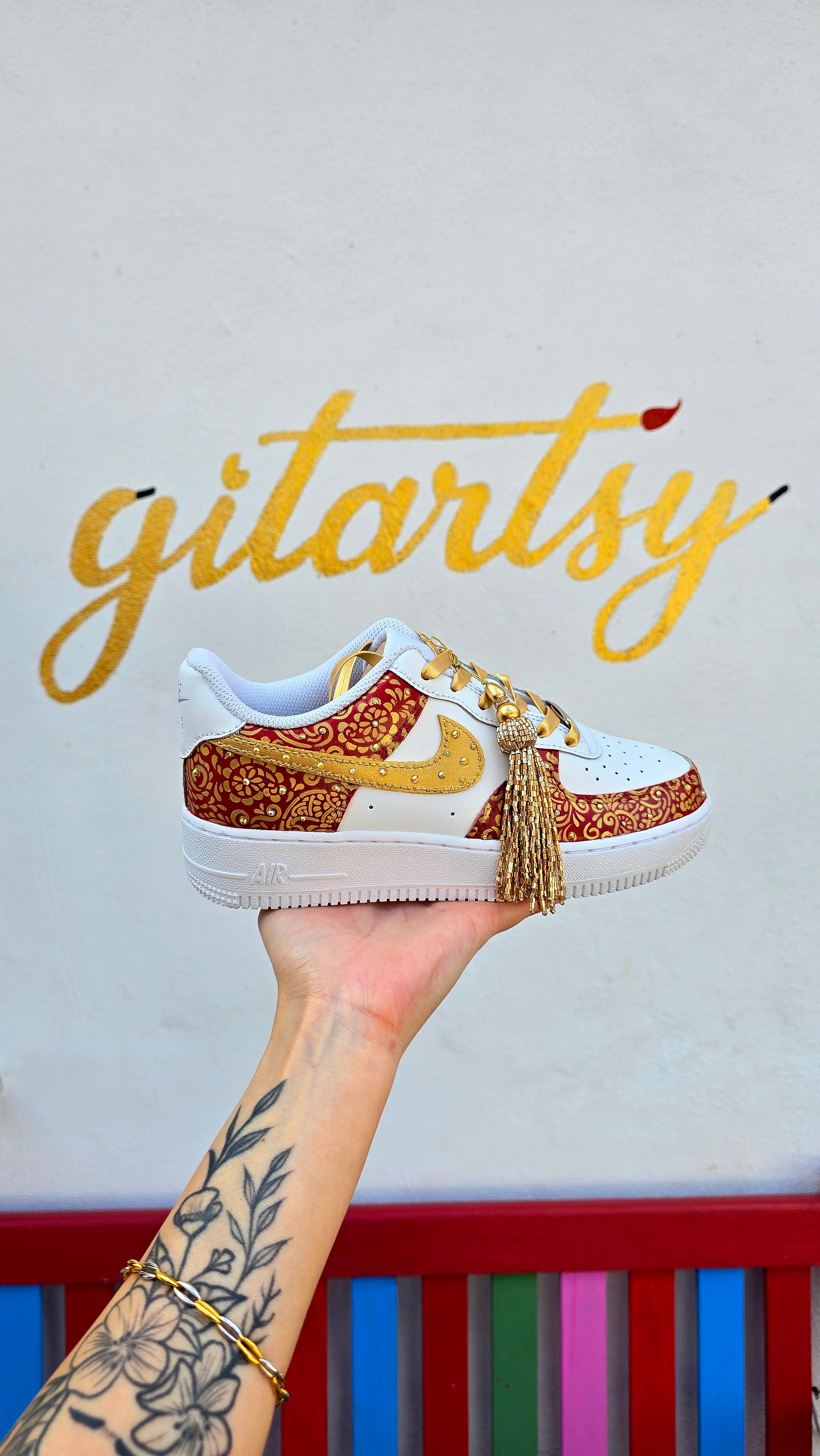 Indian Bridal Wedding Nike AF1 sneakers with crystals -  hand painted with henna mehendi designs in maroon and gold. Topped with rhinestones and paranda 