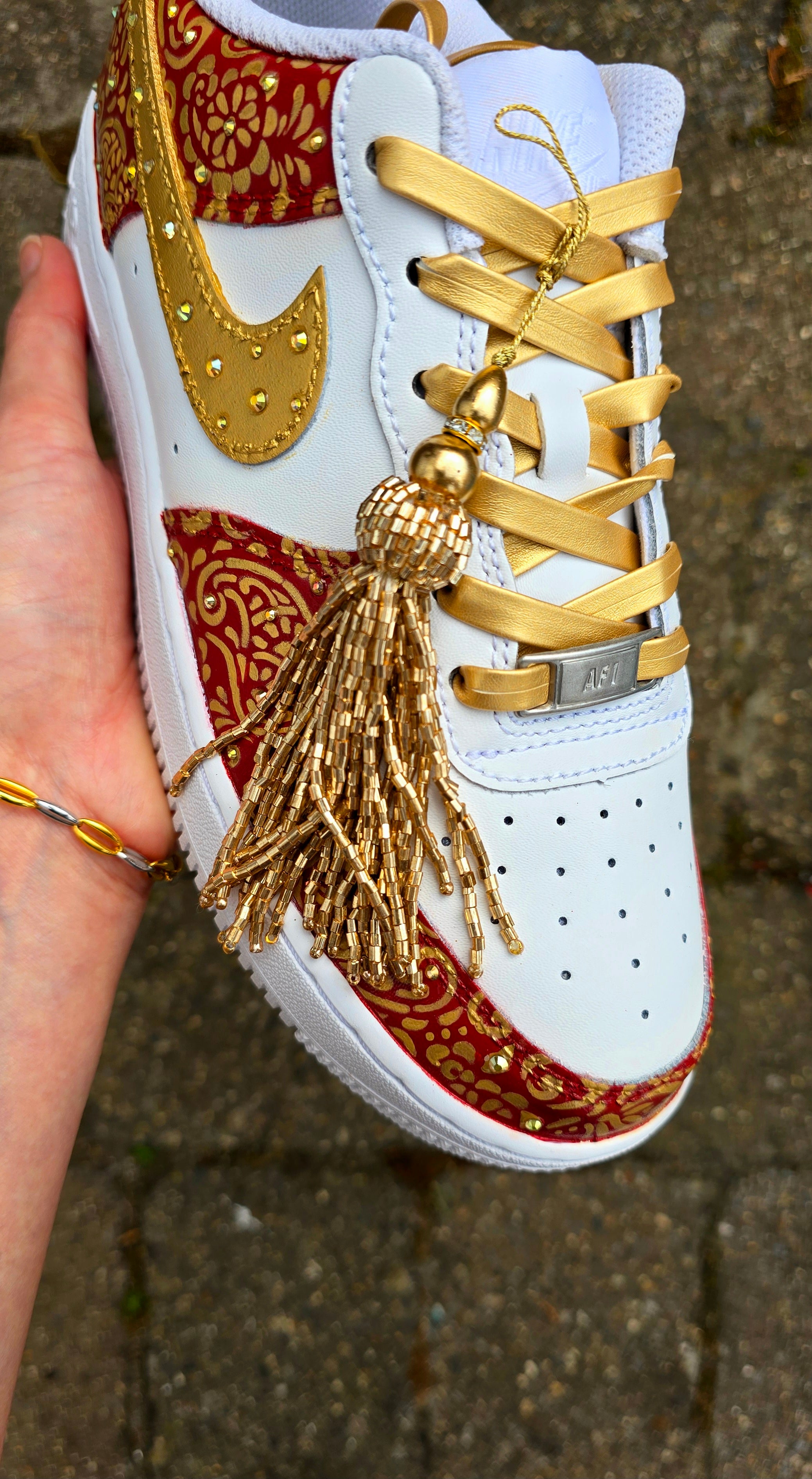 Indian Bridal Wedding Nike AF1 sneakers with crystals -  hand painted with henna mehendi designs in maroon and gold. Topped with rhinestones and paranda 